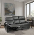 Skórzana kanapa z funkcjami relaks w salonie. Sofa w kolorze ciemnoszarym 2033.